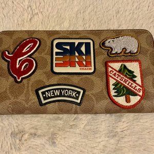 Coach Accordion Zip Wallet with ski patches